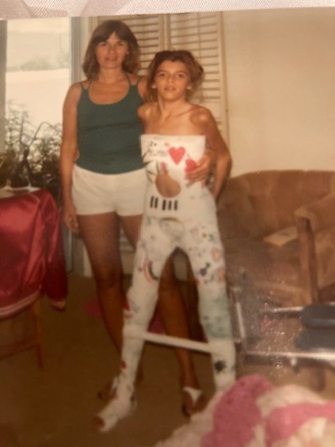 Teri in full body cast, with her mom, 1979